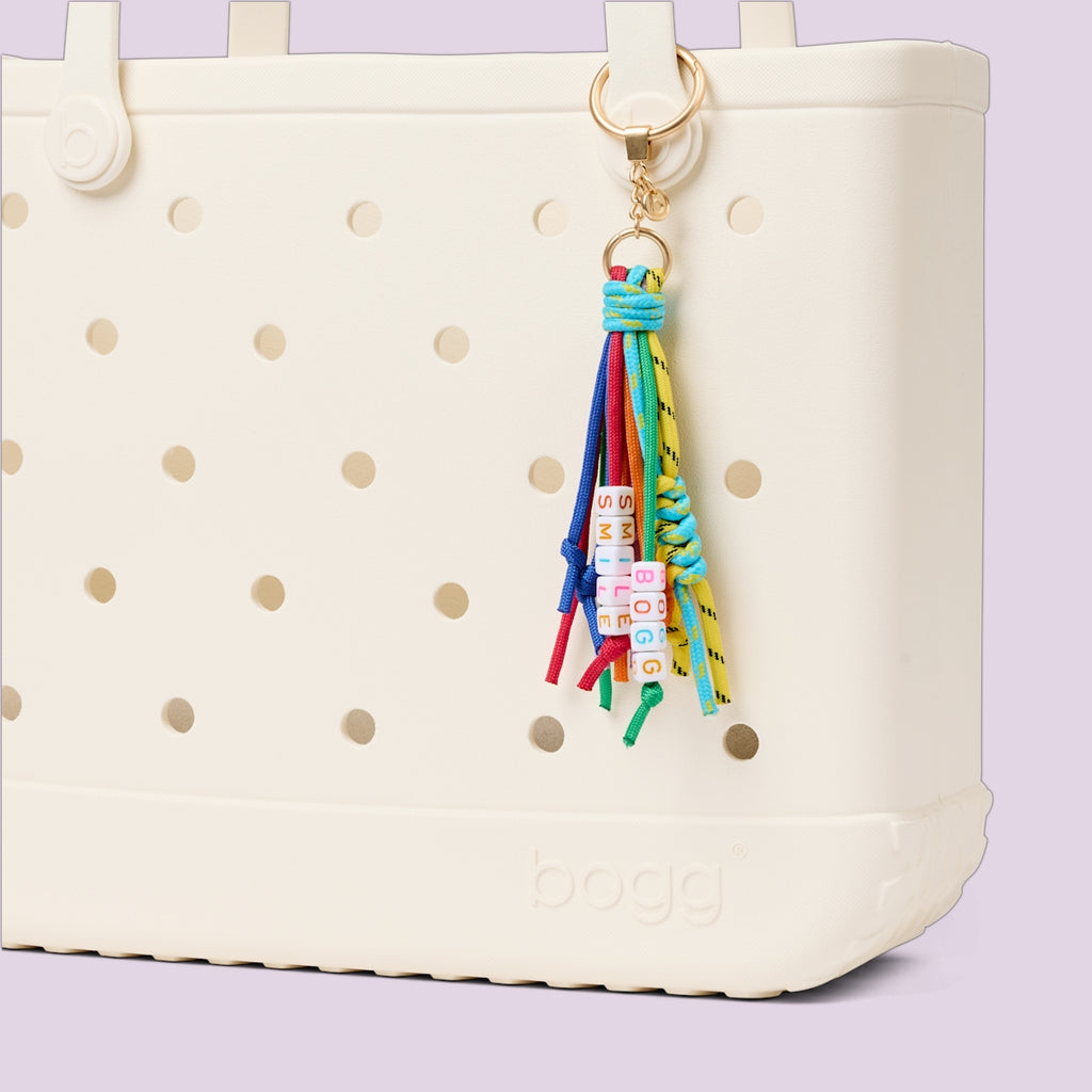 Bogg'd & Charmed Smile Tassel Island Getaway Carryall Heavy Duty Easy Clean Deep Storage Interior for Weekend Travel